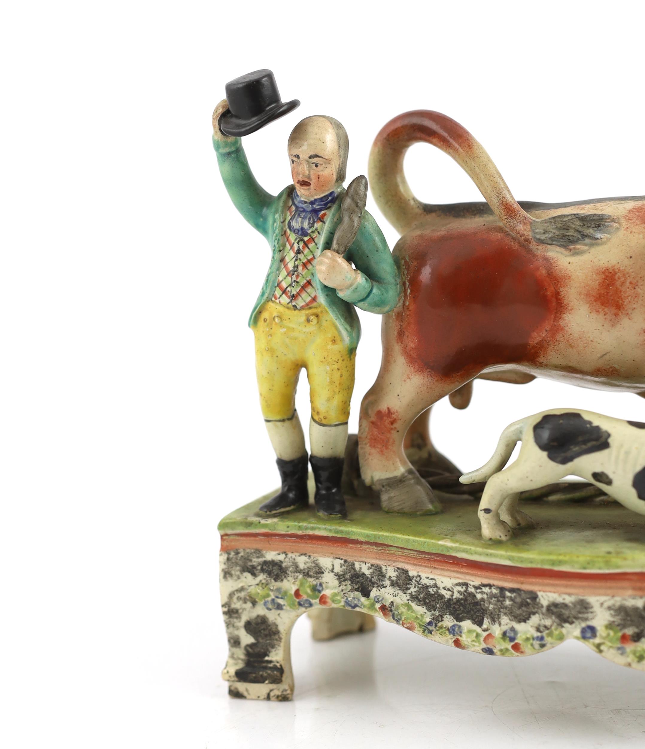 A Staffordshire pearlware bull baiting group, of Obadiah Sherratt type, c.1830, the figure of a - Image 2 of 6