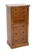 A Victorian figured walnut secretaire Wellington chest with five long and two dummy drawers