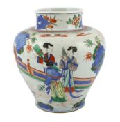 A Chinese wucai ‘ladies’ ovoid jar, 19th century, painted with ladies holding fans or musical