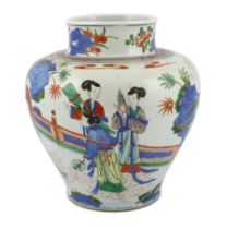 A Chinese wucai ‘ladies’ ovoid jar, 19th century, painted with ladies holding fans or musical