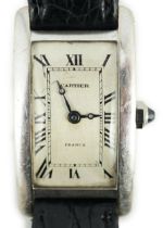 A 1920's 18ct white gold Cartier Tank Cintree (7 lignes model) manual wind wrist watch, with later