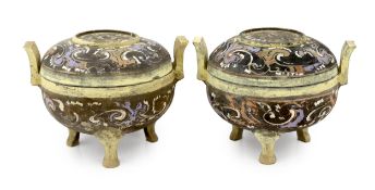 A pair of Chinese polychrome pottery ritual tripod vessels and covers, ding, Han dynasty (202BC -