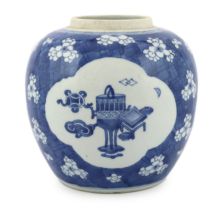 A Chinese blue and white ‘Antiques’ jar, Kangxi period, the two quatrefoil shaped reserves painted