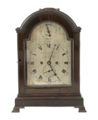 Kentish & Haynes of London, a George III ebonised eight day bracket clock in arched case with