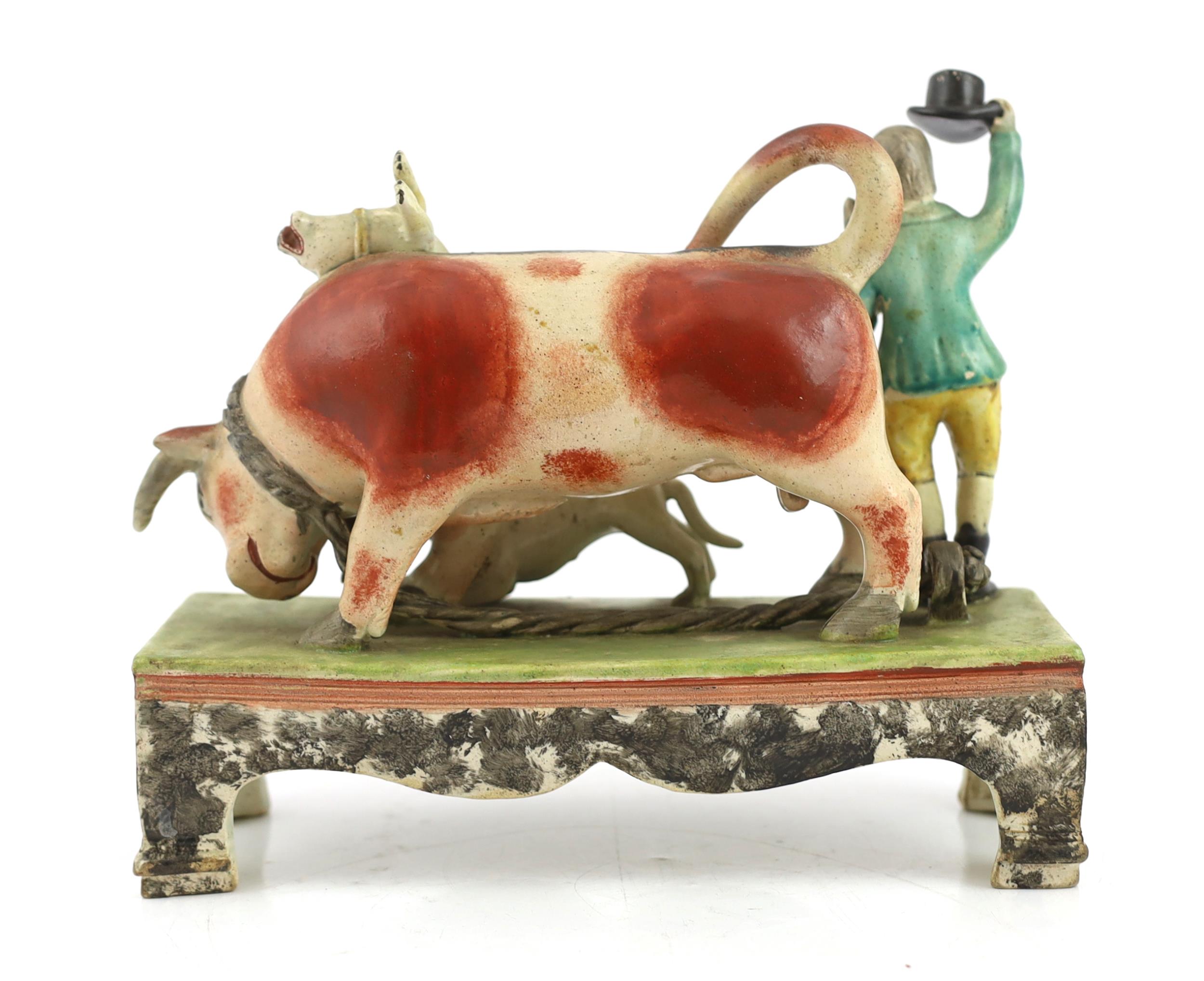 A Staffordshire pearlware bull baiting group, of Obadiah Sherratt type, c.1830, the figure of a - Image 5 of 6