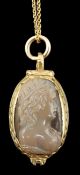 A 19th century engraved gold and inset cameo agate set oval locket, on a fine link gold chain, the