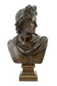 A 19th century Grand Tour bronze bust of Apollo Belvedere, on a parcel gilt plinth, initialled SB