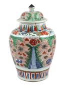 A Chinese wucai ovoid vase and cover, Transitional, Shunzhi period, painted with auspicious