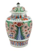 A Chinese wucai ovoid vase and cover, Transitional, Shunzhi period, painted with auspicious