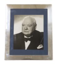 Churchill, Winston S. (1874-1965) - Sir Winston Churchill studio photograph, an original black and