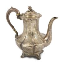 A Victorian engraved silver melon shaped coffee pot and cover with melon finial, by William
