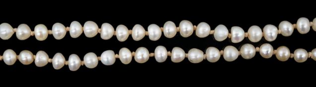 A Victorian single strand graduated natural saltwater pearl necklace, with seed pearl and enamel set
