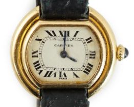 A lady's 18ct gold Cartier Ellipse manual wind wrist watch, with Roman dial and case back numbered