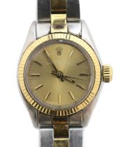 A lady's late 1970's/early 1980's stainless steel and gold Rolex Oyster Perpetual wrist watch,