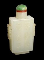 A good Chinese pale celadon jade rectangular snuff bottle, 19th century, carved in high relief to