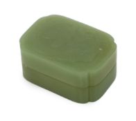 A Chinese green jade box and cover, possibly Ming dynasty, of rectangular form with re-entrant