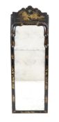 A William and Mary cushion framed lacquer pier mirror, the shaped crest decorated with a chinoiserie