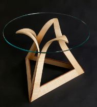 Huw Edwards Jones, a Vesuvius coffee table. Solid ripple sycamore and English walnut with a circular