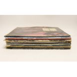 Eighteen LP record albums, artists including; The Rolling Stones, the Eagles, Madonna, Bruce
