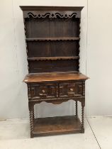 An early 20th century narrow oak dresser, width 92cm, depth 45cm, height 187cm