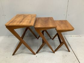 A nest of three beech and walnut rectangular designed by Bengt Ruda 'Walking' nest of tables,