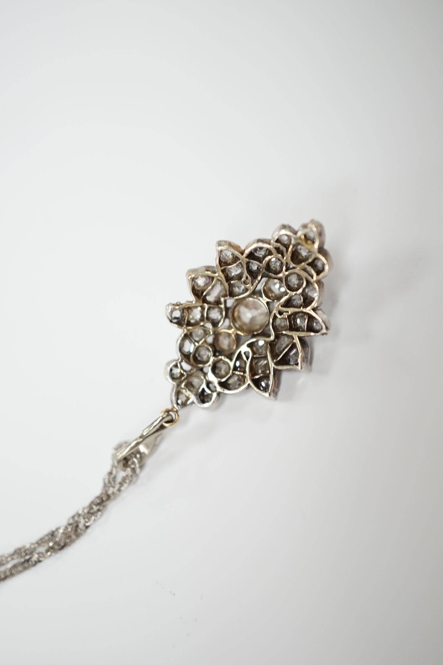 A white metal and diamond cluster set oval pendant, 27mm, on 9kt white metal chain, gross weight 5.8 - Image 4 of 4