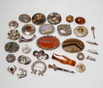 A small collection of mainly silver, sterling and white metal jewellery including Celtic brooches,