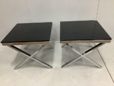 A pair of Italian square black glass and chrome X frame low occasional tables, 60cm, height 50cm