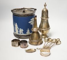 A silver sugar caster, serviette rings, a plated wine funnel, a Wedgwood biscuit barrel, etc.