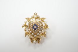 A yellow metal, sapphire, diamond and seed pearl set pendant brooch, with central heart motif, 30mm,