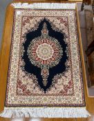 A Persian blue ground part silk mat, 98 x 63cm