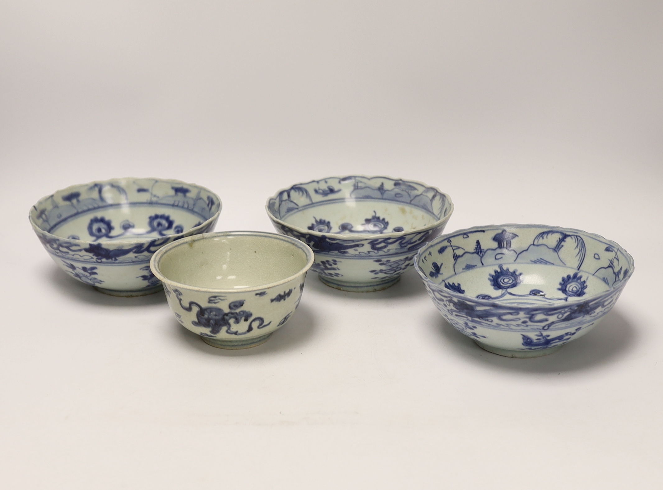 Four 16th/17th century Chinese Ming blue and white bowls, the three larger bowls from the Hatcher