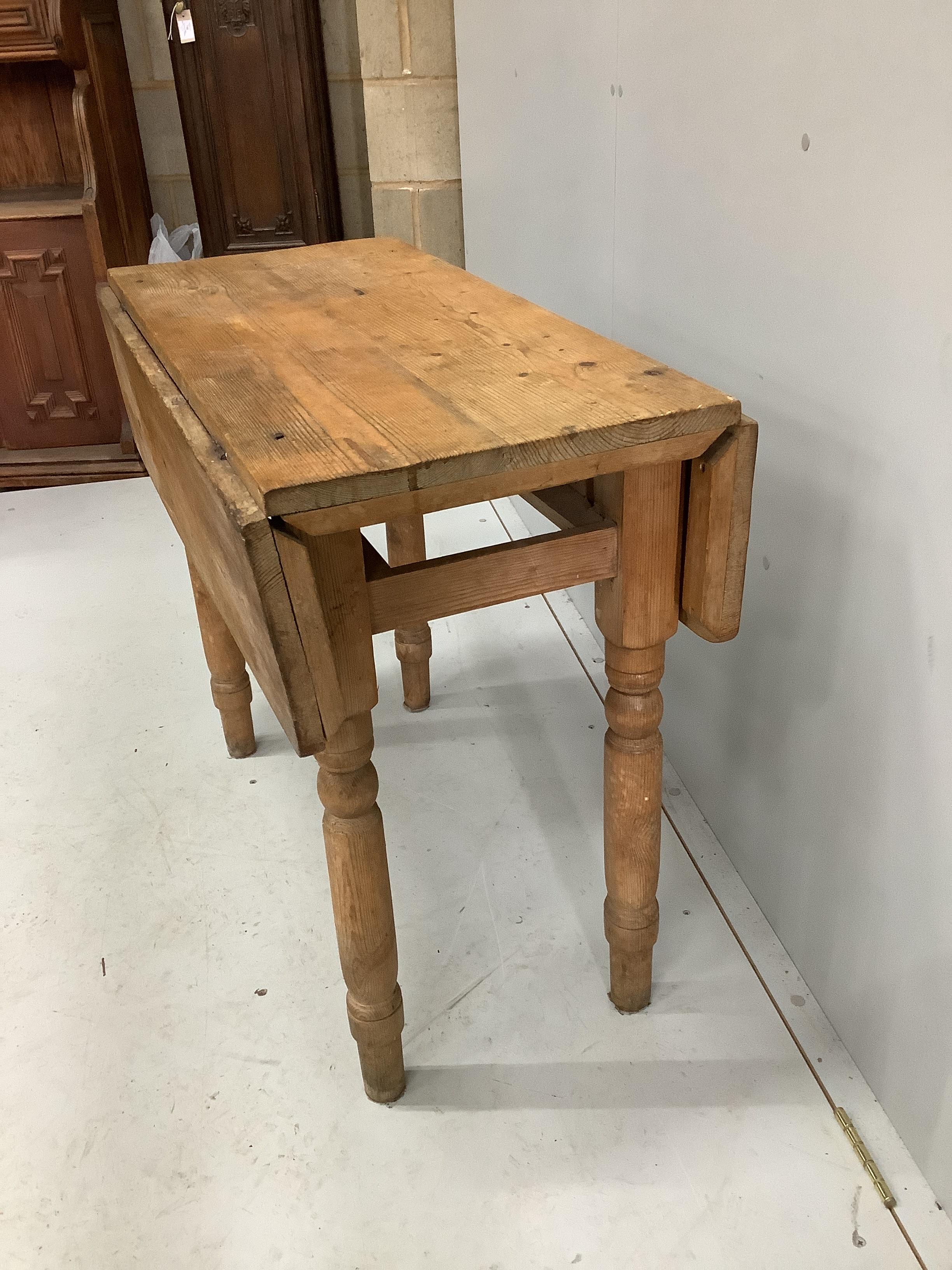 A Victorian pine drop flap table, width 89cm, depth 42cm, height 74cm (missing drawer) - Image 2 of 3