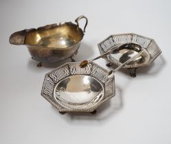 A George V silver sauce boat, Adie Bros. Birmingham, 1925, a pair of George V pierced silver