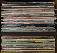 Sixty-nine LP record albums, by artists including; The Beach Boys, George Benson, Paul Simon, The