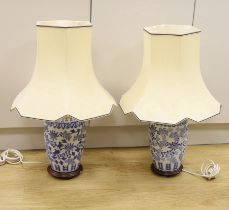 A pair of Chinese blue and white vases, converted to table lamps, overall 69cm high