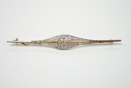 A Belle Époque yellow metal and diamond chip set bar brooch, 70mm, gross weight 3.7 grams.