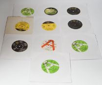Ten demo 7” singles, all with printed demo labels by The Beatles (and related), Elton John and The