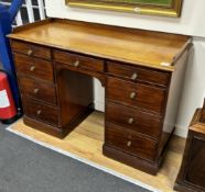 An early 19th century mahogany kneehole dressing table, width 121cm, depth 51cm, height 85cm
