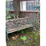 A slatted cast metal garden bench, width 127cm, height 70cm, together with a pair of wrought iron