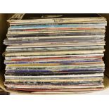 A collection of LP record albums and 12” singles (approx 50), artists include; the Beatles, Cliff