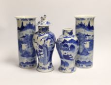 A pair of early 20th century Chinese blue and white sleeve vases and two others, one cover,