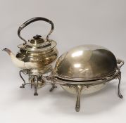 A plated breakfast dish with revolving lid and a tea kettle on burner stand, 31cm