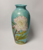 A Minton Art Pottery Studio Kensington Gore vase, decorated with flowers and a butterfly, 35.5cm