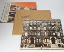 Three Led Zeppelin LP record albums; Physical Graffiti (SSK 89400), In Through the Out Door (SSK