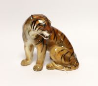 Charles Noke for Royal Doulton figure of a seated tiger HN 912, 16.5cm high