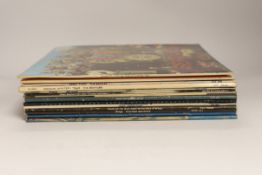 Fourteen The Beatles and related LP record albums including; Sergeant Pepper (with inserts), the