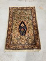 A North West Persian ivory ground silk prayer mat, 66 x 44cm