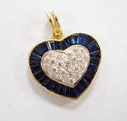 A modern 18k, pave set sapphire and diamond heart shaped pendant, overall 25mm, gross weight 4.9