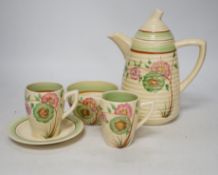 A Clarice Cliff Lynton shape coffee set, for six places, coffee pot 18cm high (9)